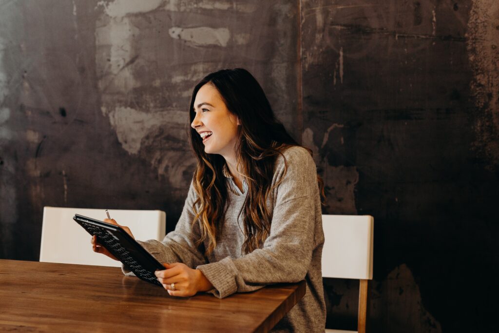 happy woman at computer